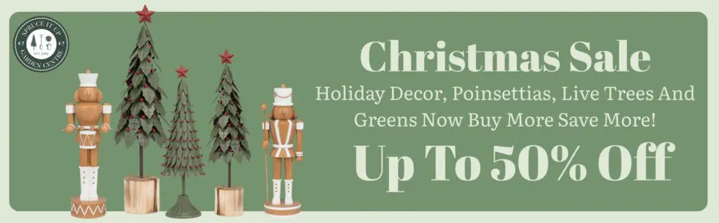 Website Banners - Christmas Sale Christmas sale banner at the Garden Centre featuring wooden nutcrackers, tin Christmas trees, and text promoting up to 50% off on holiday decor, poinsettias, live trees, and greens.